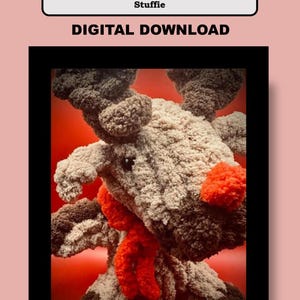 May include: A crocheted reindeer stuffed animal with a red scarf. The reindeer is brown and white and has a red nose. The background is red.