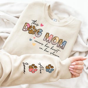 Custom Dog Mom Sweatshirt, This Dog Mom Wears Her Heart On Her Sleeve, Mothers Day Gift Personalized Dog Name Sweatshirt Dog Mama