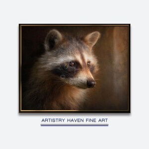 May include: A framed fine art print featuring a detailed portrait of a raccoon. The raccoon has brown and gray fur, with a distinctive black mask around its eyes. The artwork is set against a warm, neutral background, with the text "ARTISTRY HAVEN FINE ART" below.