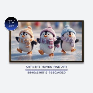 May include: A framed artwork featuring three cartoon penguins wearing winter hats and scarves. The penguins are depicted on a snowy surface, each with a unique hat and scarf color. The artwork is labeled "TV ART" and "ARTISTRY HAVEN FINE ART".