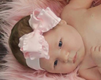 Girls Light Pink Ruffle Bow on Stretch Headband