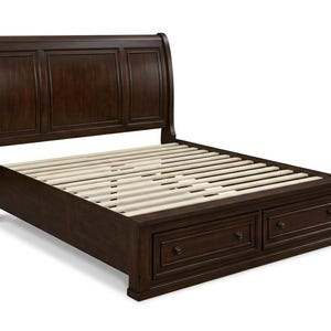 May include: A dark brown wooden sleigh bed frame featuring a curved headboard with three recessed panels and a footboard containing two integrated storage drawers with small dark knobs. The bed includes a series of light-colored wooden slats.