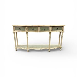 May include: An off-white console table with four drawers and a lower shelf. The drawers have a light green floral design. The table has a curved shape and is supported by four slender, fluted legs.