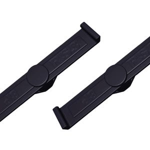 Puede incluir: Dos desmontadores de neumáticos negros con el texto "TRUSS" impreso en ellos. Los desmontadores están diseñados para quitar e instalar neumáticos de bicicleta.