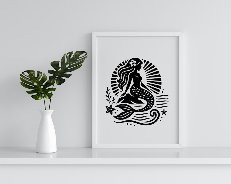 May include: Black and white illustration of a mermaid sitting on a wave with a sunburst behind her. The mermaid has a flower in her hair and a long flowing tail.
