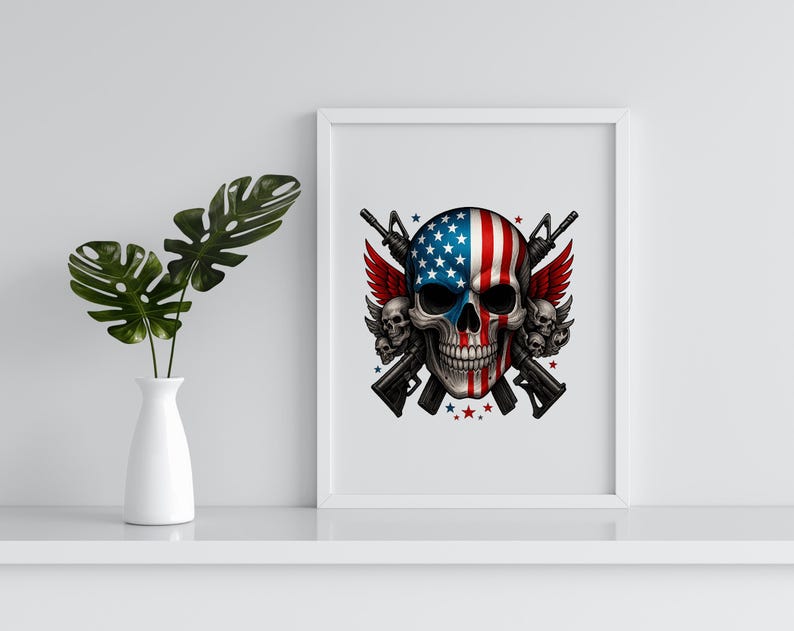 May include: A framed print featuring a skull design with the American flag painted on it. The skull has red wings and is crossed with two rifles. The print is in a white frame and is displayed on a white shelf.