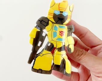 Pinza para el pelo de abejorro: pinza de acetato con diseño de robot transformador