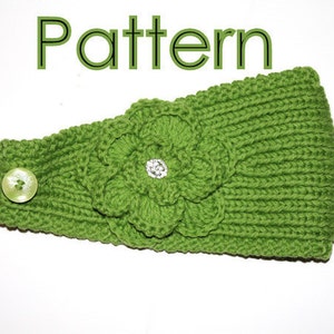 May include: Green knitted headband with a large green flower and a button. The headband has the word "Pattern" written above it.