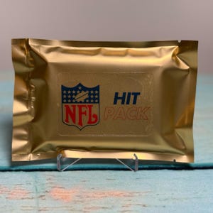 NFL Hit Pack™  Mystery Football Cards-10 Cards with guaranteed Autograph, Memorabilia (patch), Rookie RC, & Numbered Card. Possible Downtown