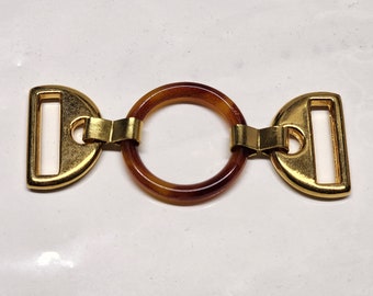 Tortoiseshell Bag Clothing Accessory O ring Style Buckle Measures approx  2.75 " inches Made In Canada