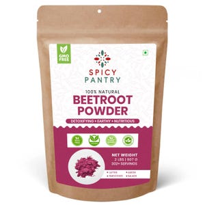 May include: A brown paper bag of Spicy Pantry beetroot powder. The bag has a white label with the words "100% Natural Beetroot Powder" in large letters. The label also includes the words "Detoxifying + Earthy + Nutritious". The net weight is 2 lbs (907 g).