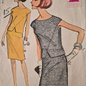 May include: Vintage McCall's sewing pattern featuring two women's dress designs. One dress is a two-piece set in a mustard yellow color. The other is a gray tweed-like fabric, also a two-piece set. The pattern includes illustrations of the dresses.