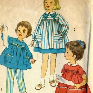 Vintage jaren 50 eenvoud 3177 peutermeisjes smocktop, kunstenaarsschort en broek naaipatroon maat 44