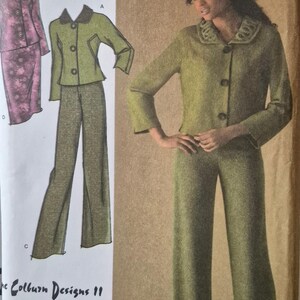 May include: A sewing pattern envelope for Colburn Designs 11 featuring illustrations of a jacket and skirt set in purple, and a jacket and pants set in olive green. The cover displays a photograph of a jacket and pants set in olive green.