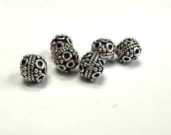 6pcs Bali Sterling silver beads. Approximately 7mm x 6.5 mm. (N)