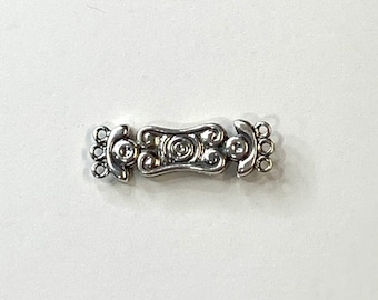 Silver 3 strand hook clasp. Stamped 92.5