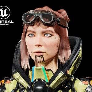 May include: A woman with pink hair wearing a futuristic helmet and goggles. She has a black and white tattoo on her chin.