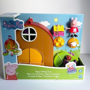 May include: A Peppa Pig Peppa's Petting Farm playset in its original packaging. The box features a brown barn with yellow doors, a Peppa Pig figure in a red dress, a yellow animal shelter, a chicken, chicks, and a green circular play area.