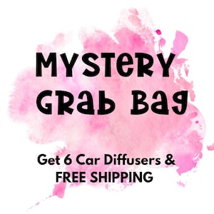 May include: Pink watercolor background with the text "MYSTERY Grab Bag" in black. Below the text is "Get 6 Car Diffusers & FREE SHIPPING" in black.