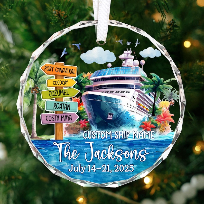 May include: A round, clear ornament with a cruise ship design. The ornament features a cruise ship, palm trees, and directional signs pointing to various ports. Text includes "The Jacksons" and "July 14-21, 2025".