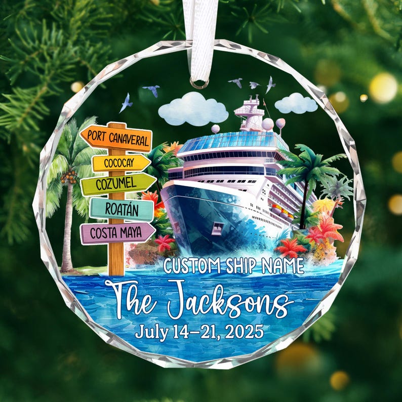May include: A round, clear ornament with a cruise ship design. The ornament features a cruise ship on blue water, palm trees, and a signpost with destinations. Text includes "The Jacksons" and "July 14-21, 2025."
