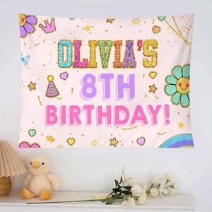 May include: A light pink birthday banner with the text "OLIVIA'S 8TH BIRTHDAY!" in colorful, glittery letters. The banner features cartoon flowers, stars, hearts, and a rainbow design. Gold confetti dots the background.