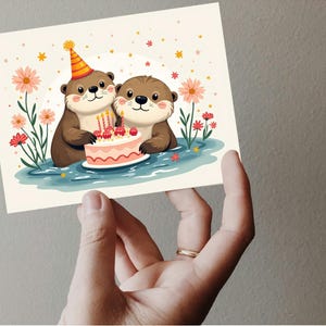 Jolies loutres importantes nageant avec un gâteau Carte de fête d'anniversaire imprimable JPG PDF