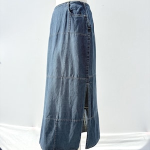 May include: A rustic wooden sign with the text "Welcome to our home" in white lettering. The sign features a distressed finish and a simple, inviting design, perfect for a front porch or entryway.