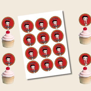 May include: A sheet of round stickers and cupcakes with toppers. The stickers feature a cartoon woman on a red background with a leopard print border. The cupcakes have pink frosting and a cherry on top.