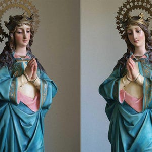 K&ouml;nnte beinhalten: Statue einer Frau mit langen braunen Haaren, die ein blaues Gewand mit goldenen Verzierungen und ein rosa Untergewand tr&auml;gt. Sie hat eine goldene Krone und einen Sternen-Heiligenschein. Ihre H&auml;nde sind zum Gebet gefaltet.