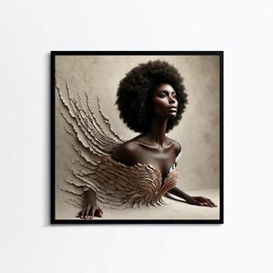 May include: A framed art print depicting a woman with dark skin and a large afro hairstyle. The woman is seemingly breaking through a textured, beige surface, with a detailed, layered design around her chest. The artwork is set against a neutral background.