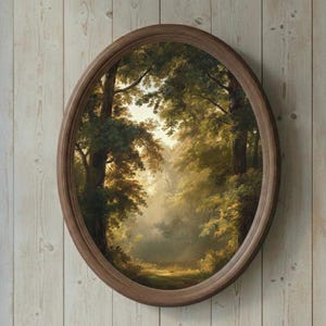 May include: An oval-shaped framed artwork depicting a sunlit forest scene. The painting features a path leading into the distance, surrounded by lush green trees and foliage. The frame is made of dark brown wood, and the artwork is mounted on a light-colored wooden wall.