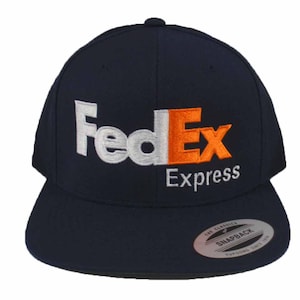 May include: A navy blue baseball cap with a white and orange embroidered FedEx Express logo.