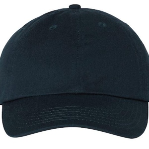 May include: A set of three ceramic mugs with a speckled, matte finish. The mugs are in shades of cream, light gray, and dark gray. Each mug has a simple, minimalist design, perfect for coffee or tea.