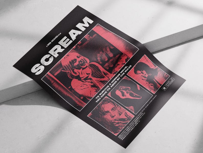 May include: A black poster with the title "SCREAM" in large white letters. The poster features red and black images from the horror movie, including a screaming figure and the iconic Ghostface mask. Text reads "TO SURVIVE A HORROR MOVIE, YOU HAVE TO ABIDE BY THE RULES."