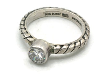 Lori Bonn Clear Crystal and Sterling Silver Ring Diagonal Detail Raised Bezel Setting