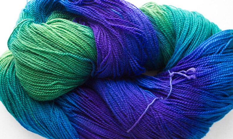 8 oz. fingering Blue Peacock 1120 yds Superwash merino