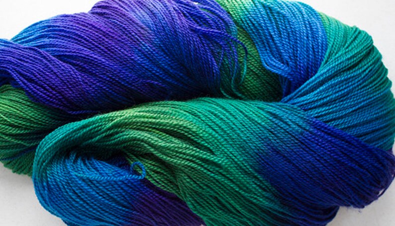 8 oz. fingering Blue Peacock 1120 yds Superwash merino
