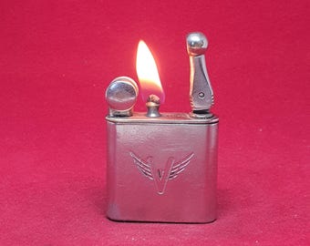 Rare Veedol adv. lighter Surcouf 75-1 by Gaston Gaubert