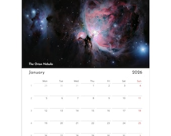 May include: A wall calendar for 2026 featuring a vibrant image of the Orion Nebula. The calendar includes the month of January, with dates and days of the week clearly displayed. The top of the calendar has a spiral binding.