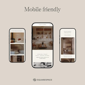 May include: Three smartphones displaying website designs. The central phone shows "Interior Studio" with a photo of a living room. The other phones display "My Philosophy" and "Featured Projects." The phrase "Mobile friendly" is at the top.