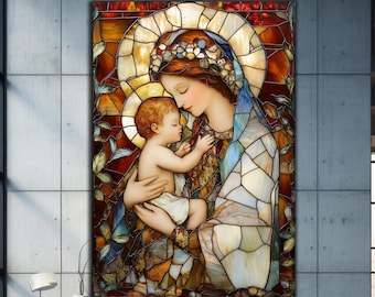May include: A stained glass artwork depicting a mother and child. The artwork features warm tones of brown, orange, and yellow, with accents of blue and green. The mother wears a blue veil and holds the child, who is dressed in white. The artwork is framed.