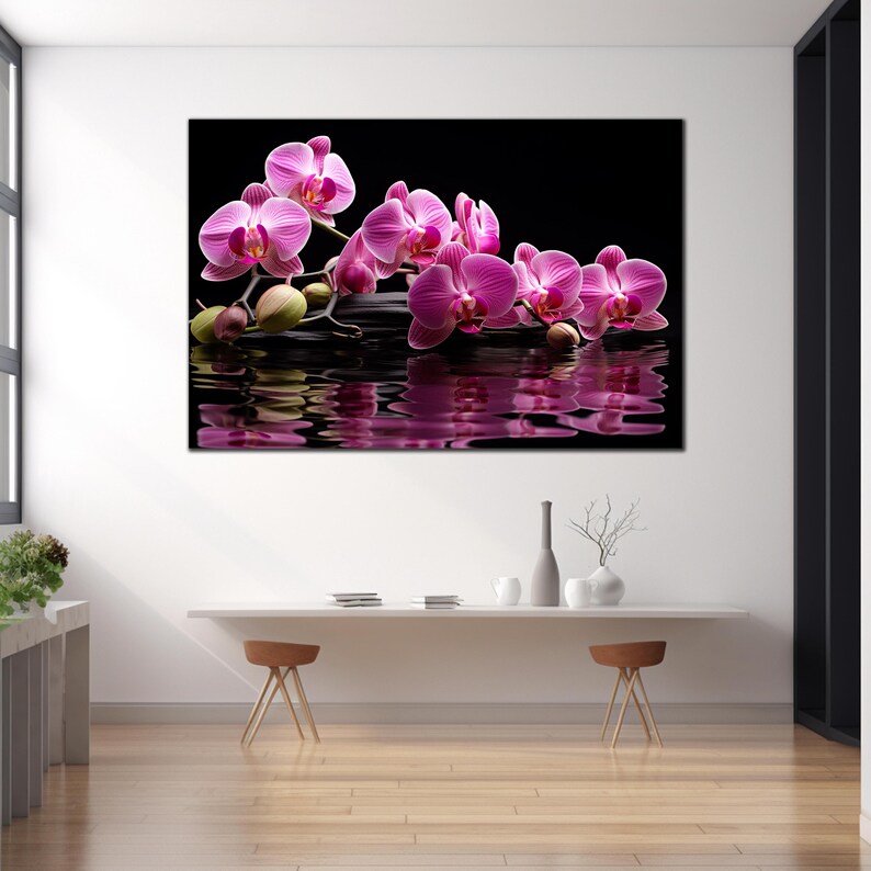 May include: Pink orchids floating on a black surface with a reflection in the water below.