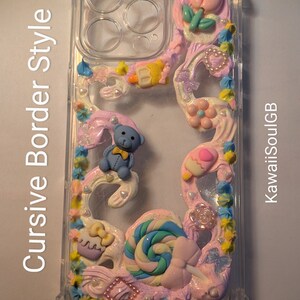 May include: A clear phone case with a pink, blue, and white design. The design features a teddy bear, a lollipop, and other cute details. The case has a cursive border that says "Cursive Border Style".