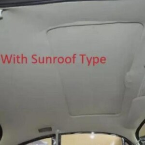 the interior of a car, specifically the sunroof area.