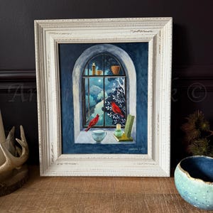 Framed original painting titled "The Red Cardinals" by Amanda Clark - red cardinal painting, interior art, window scene, bird art, nature