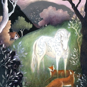 May include: A painting featuring a white horse with grey vine patterns standing in a green field with two orange foxes. The scene includes dark trees, a small house in the distance, and a pale moon in the sky. The artist name Amanda Clark is visible.