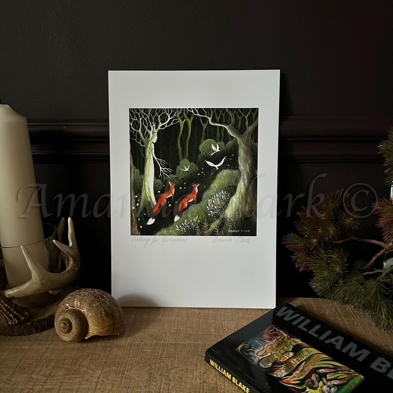 May include: A print of a painting depicting a woman standing in a dark forest with three foxes and birds flying overhead. The text "Waiting for Dawn" is written at the bottom of the print.
