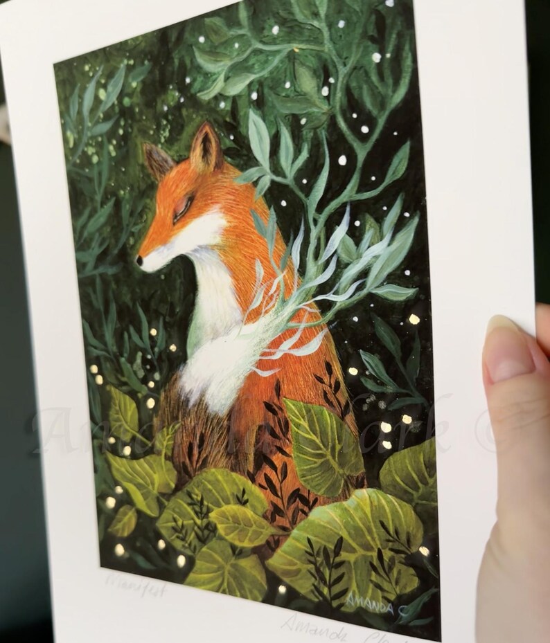 May include: A red fox with white fur on its chest is nestled in a lush green forest. The fox is surrounded by leaves and branches, and there are small white dots scattered throughout the image, resembling snow or stars.