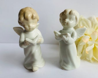 Vintage Fitz and Floyd Porcelain Choir Angels - Pair Of Bisque Porcelain Choir Angels Holding A Book